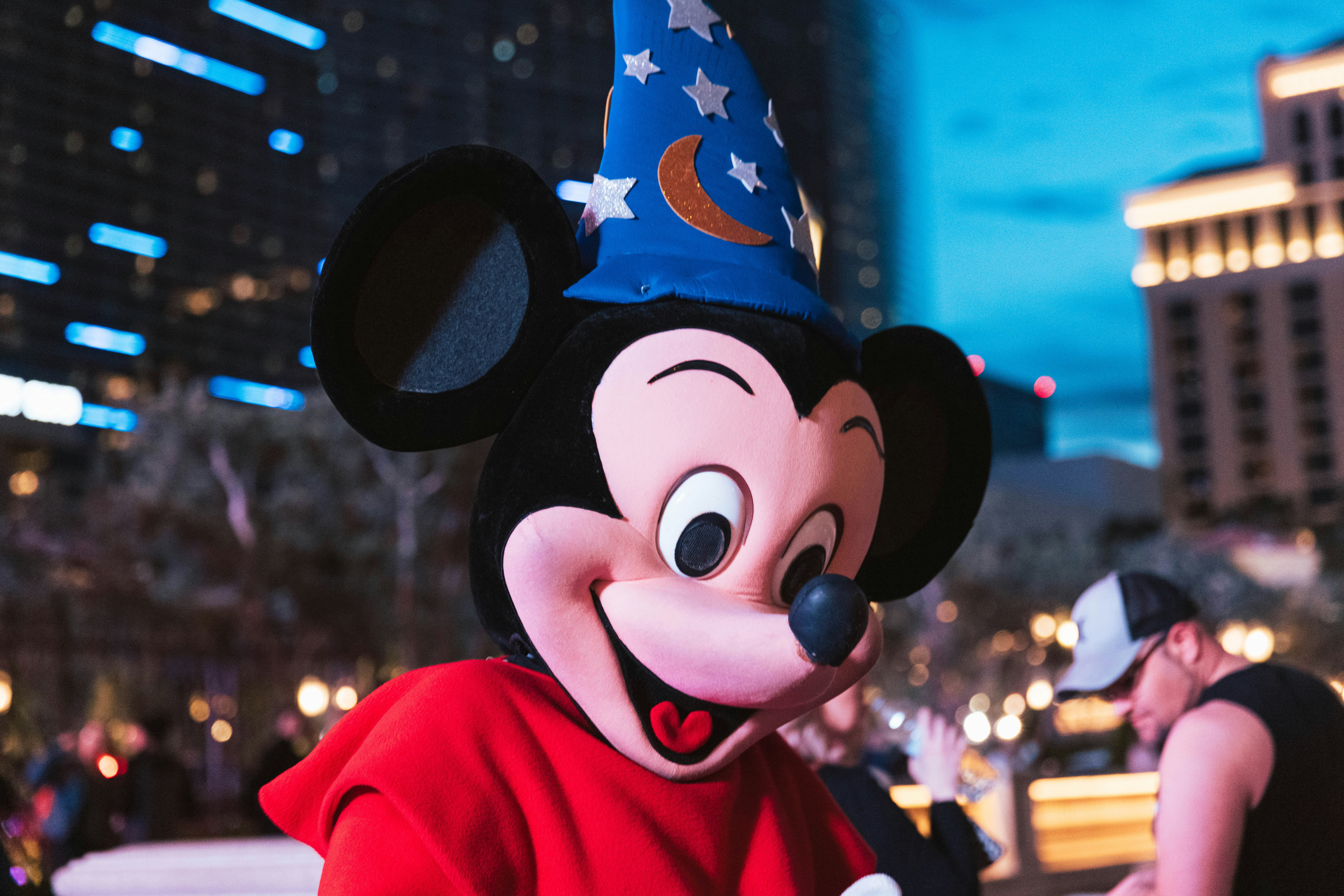 mickey mouse mascot in red jacket